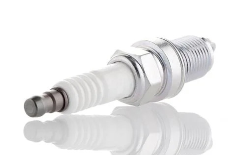 Spark-plug Spark-plug on white reflective background Copyright: xZoonar.co... Stock Photos