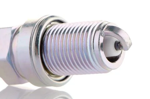Spark-plug Spark-plug on white reflective background Copyright: xZoonar.co... Stock Photos