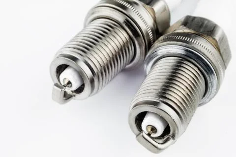 Spark plugs on a light background Stock Photos