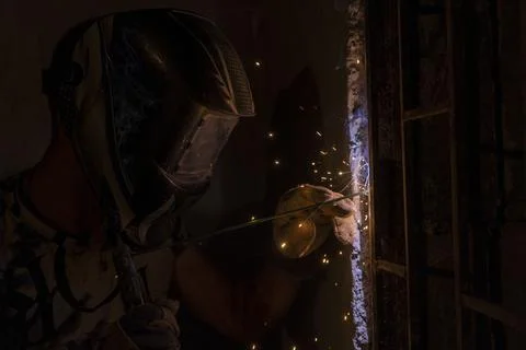 A spark with a small golden flying while welding Fotos Stock