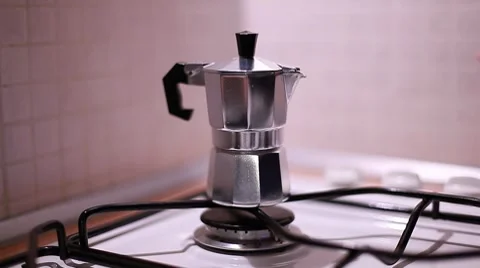 Sparking coffee maker on the stove Stock Footage 8826564