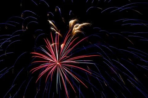 Sparkle Fireworks in Night Sky Stock Photos