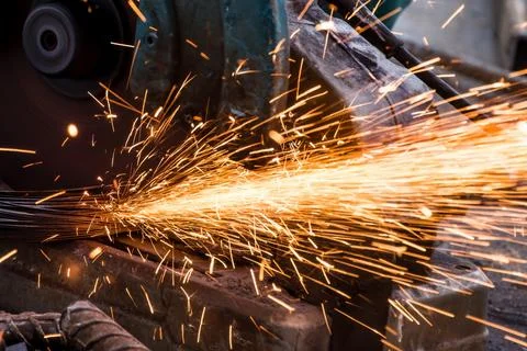The sparkle of Metal cutting machine at work Stock Photos