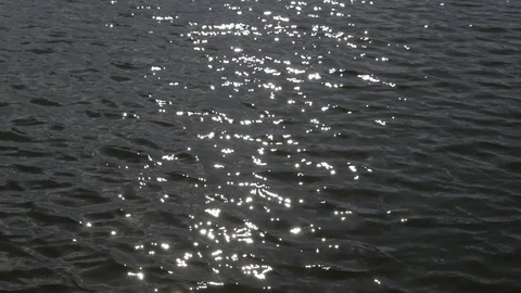 Sparkle on surface of water mid shot Stock Footage 105125873