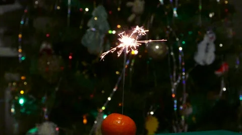 Sparkler And Christmas Tree Stock Footage 45547382