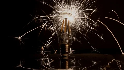 Sparkler Behind LED Light Bulb With Wide Spread 库存影片 99122122
