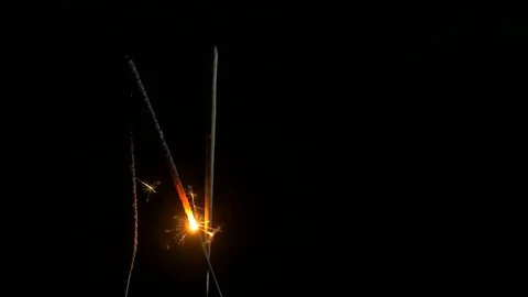 Sparkler on a black background fire in shape of letter N Video stock 82688584