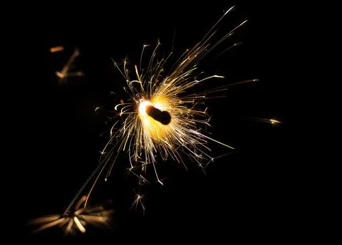 Sparkler on Black Background Stockfoto's