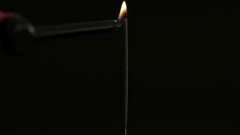 Sparkler on Black Background Real Time Stock Footage 128079934