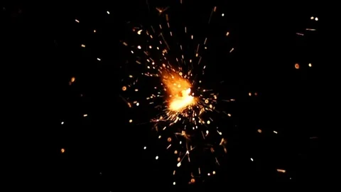 Sparkler on a black background in slow motion Stock Footage 81935941