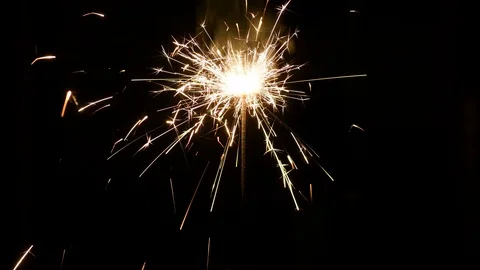Sparkler on black Stock Footage 99196102