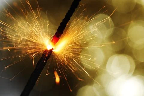 Sparkler on bokeh background Stock Photos
