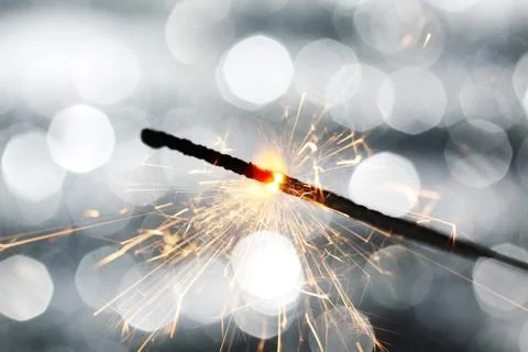 Sparkler on bokeh background Stock Photos