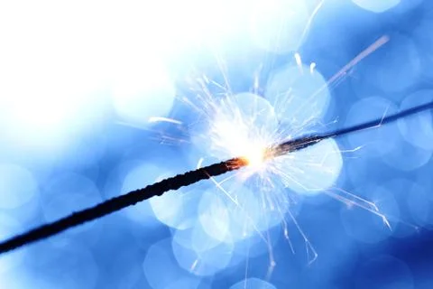 Sparkler on bokeh background Stock Photos