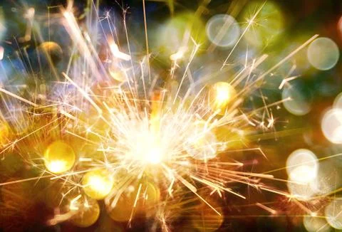 Sparkler on bokeh background Stock Photos