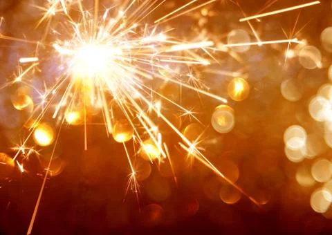Sparkler on bokeh background Stock Photos