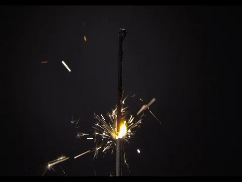 Sparkler burning on a black background, close-up, Burning fire Stock Footage 74290407