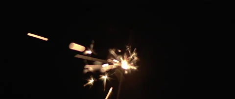 Sparkler burning down in slow motion in the dark. Stock Footage 132961607