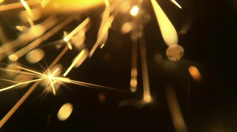 Sparkler burning isolated in slow-motion in macro shot Stock Footage 56329550