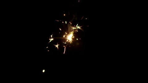 Sparkler burning from right to left on black in slow motion180fps HD Stock Footage 49634271