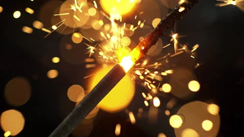 Sparkler Burning in Slow Motion Emitting Shower of Glowing Sparks Stock Footage 171132355