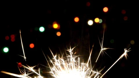 Sparkler on Christmas tree background Stock Footage 101888706