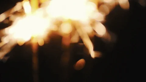 Sparkler on dark background Stock Footage 73929083