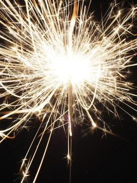 Sparkler on a dark background Stock Photos