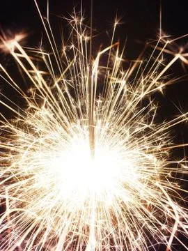 Sparkler on a dark background Stock Photos