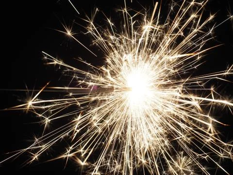 Sparkler on a dark background Stock Photos
