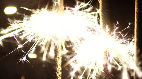 Sparkler on dark background slow motion Stock Footage 73927171