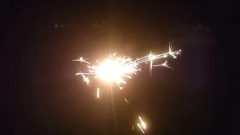 Sparkler in the dark Stock Footage 98423393