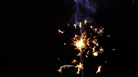 Sparkler festive fire slow mo. new year feet close-up Stock Footage 148291326