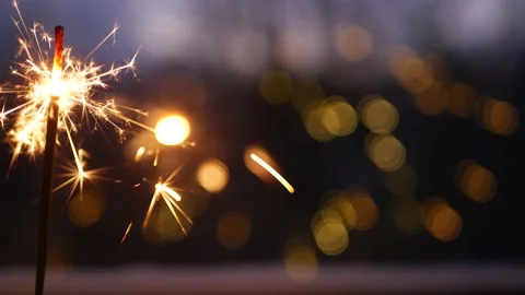 Sparkler firework burning on window, New Year or Christmas bengal lights glowing Stock Footage 158089348