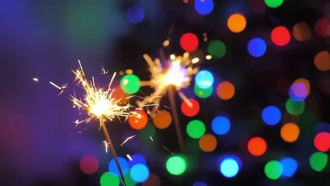 Sparkler Firework with Festive Bokeh Lights Video stock 329615985