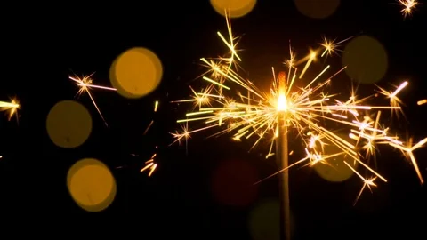 Sparkler firework in slow motion. Black isolated backgroung, bokeh Stock Footage 115367904