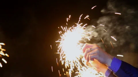 Sparkler in hand close-up Stock Footage 61694068