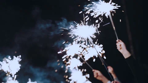 Sparkler in the hands of guests close-up 스톡 동영상 166754949