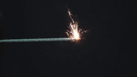 Sparkler Over Black background. Slow Motion Stock Footage 69972550