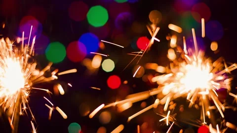 Sparklers-on-the-background-of-lights Stock Footage 137838826