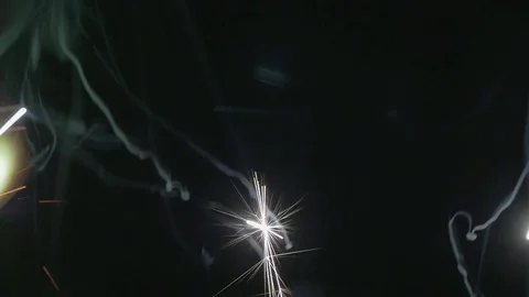 Sparklers on a black background Stock Footage 76970849