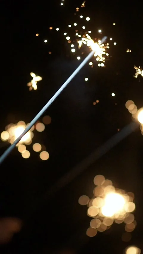 Sparklers explode during the evening celebration 스톡 동영상 333260798