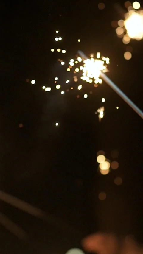 Sparklers explode during the evening celebration Video stock 333260806