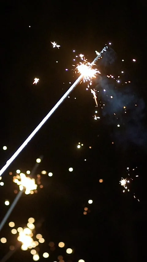 Sparklers explode during the evening celebration Stock-Footage 333260812