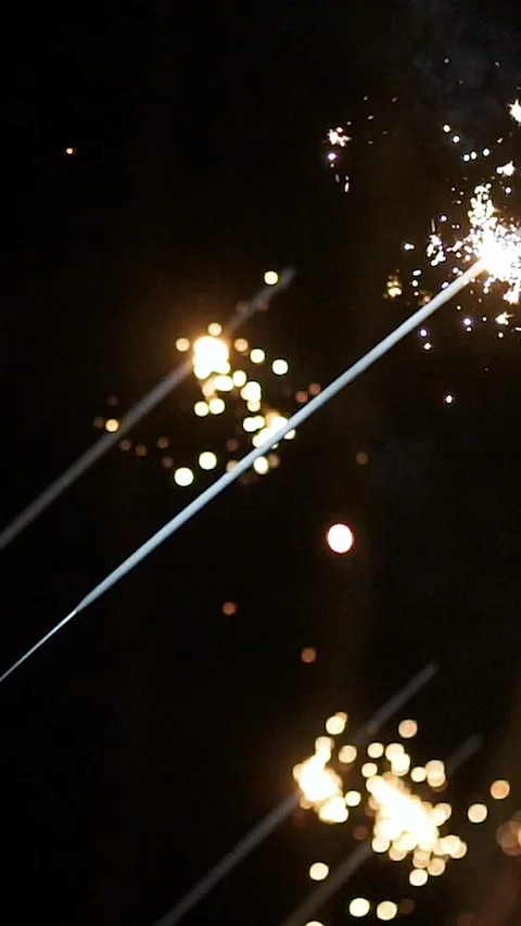 Sparklers explode during the evening celebration Video stock 333260813