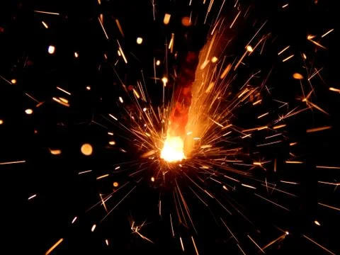 Sparklers with sparks on a black background Stock Photos