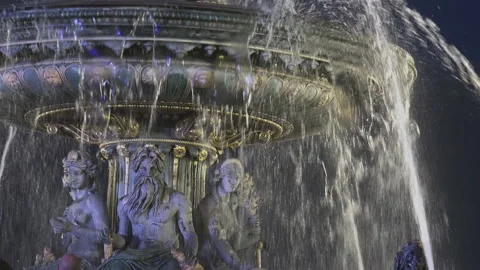The sparkles but also the jets of water cover the Concorde fountain, night view Stock Footage 238006067