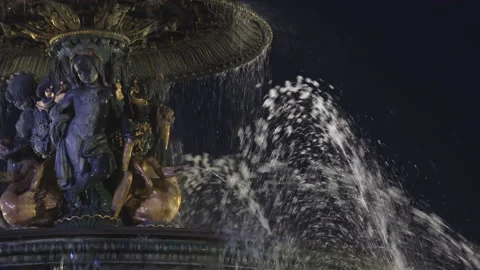 The sparkles but also the jets of water cover the Concorde fountain, night view Stock Footage 238006093
