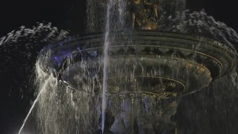 The sparkles but also the jets of water cover the Concorde fountain, night view Stock Footage 238006175