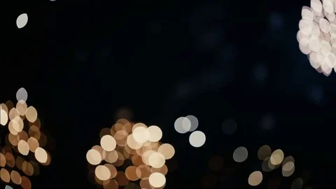 Sparkles of fireworks in bokeh Stock Footage 77253060